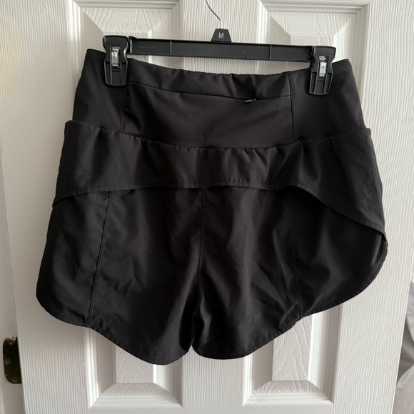 NWOT RUNNING SHORTS - Picture 2 of 3